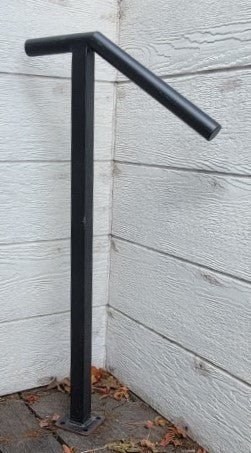 One-step metal stair handrail with flat black finish