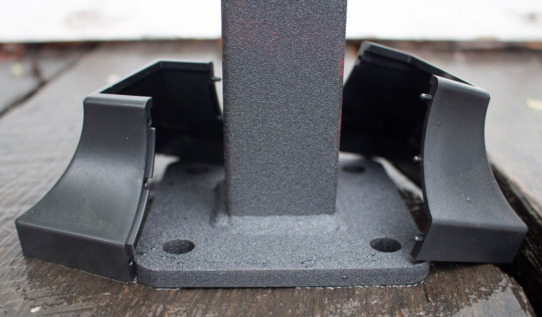 Textured black round metal handrail