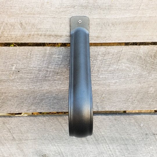Wall-mounted black metal grab rail