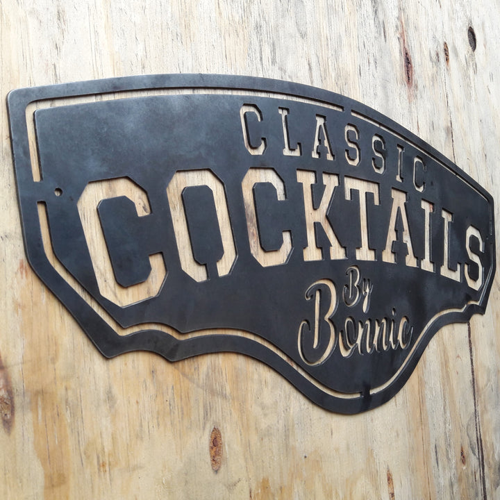 This metal bar sign reads, " Classic Cocktails By Bonnie"