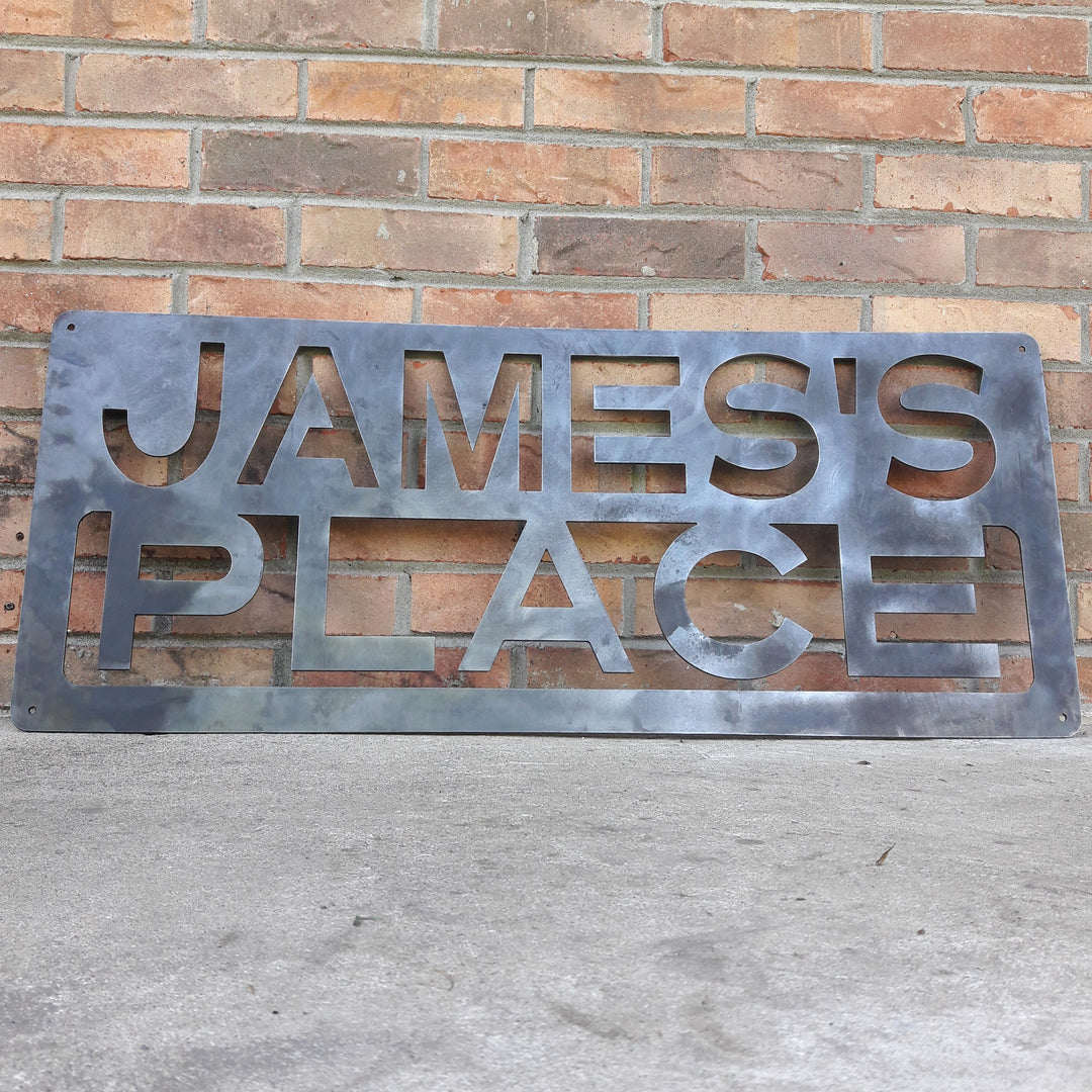 This is a custom metal sign that reads, "James's Place".