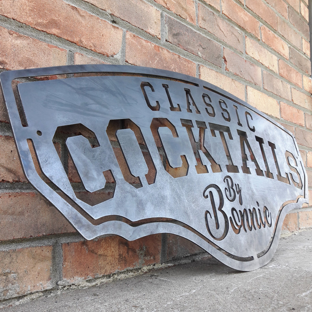 This metal bar sign reads, " Classic Cocktails By Bonnie"