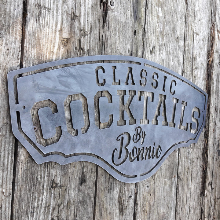 This metal bar sign reads, " Classic Cocktails By Bonnie"