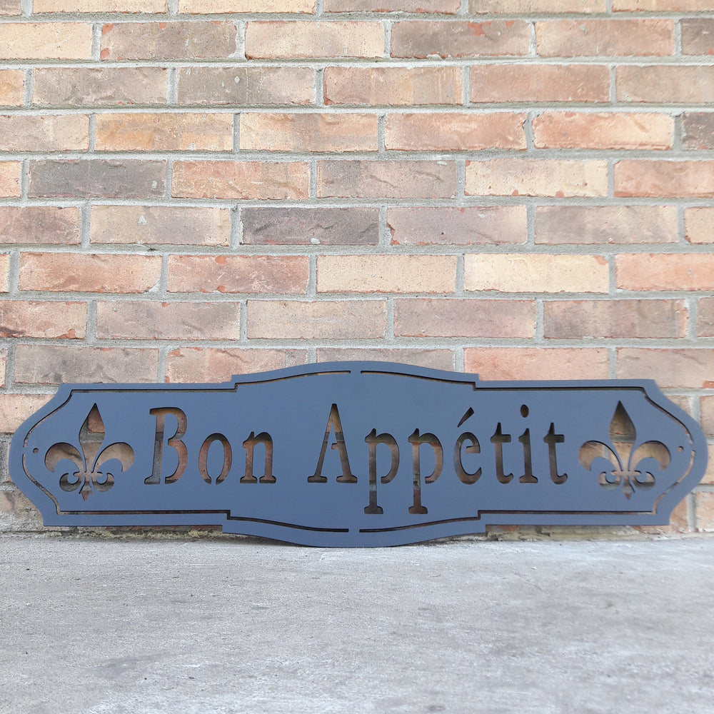 French country, outdoor black powder coat, metal sign which reads, "Bon Apetit"
