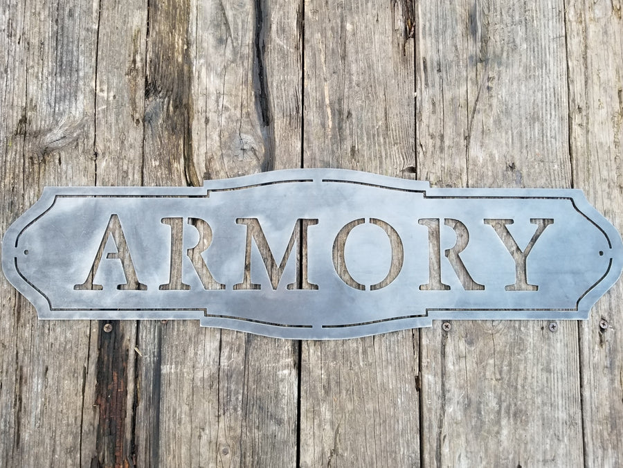 This sign has a classic shape and reads, "ARMORY"