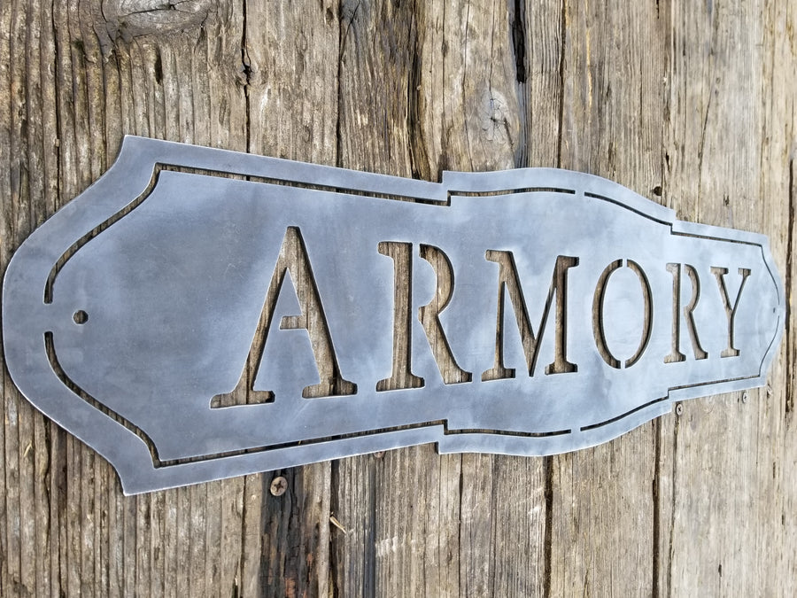 This sign has a classic shape and reads, "ARMORY"