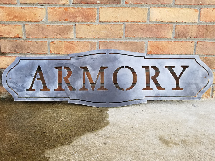 This sign has a classic shape and reads, "ARMORY"