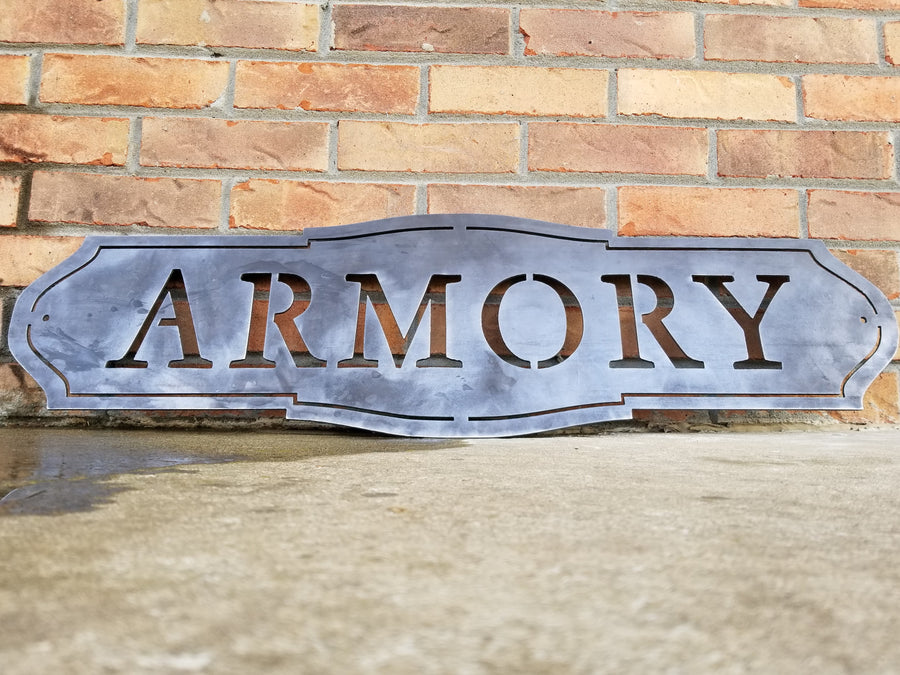 This sign has a classic shape and reads, "ARMORY"