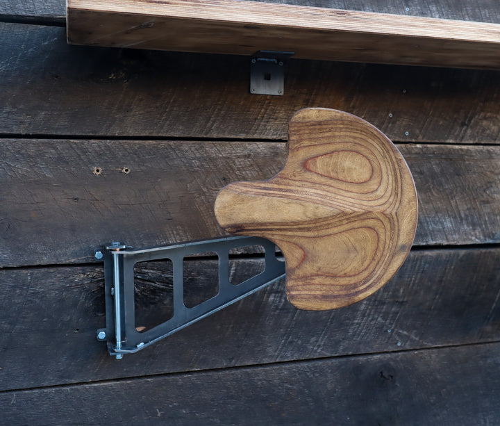 Heavy-duty steel wall mounted bar stool in extended position