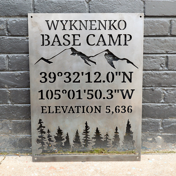 Personalized metal cabin coordinates sign with mountain and tree design