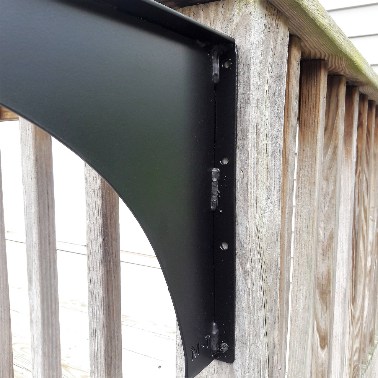 This picture highlights a hanging post and shows the mounting holes
