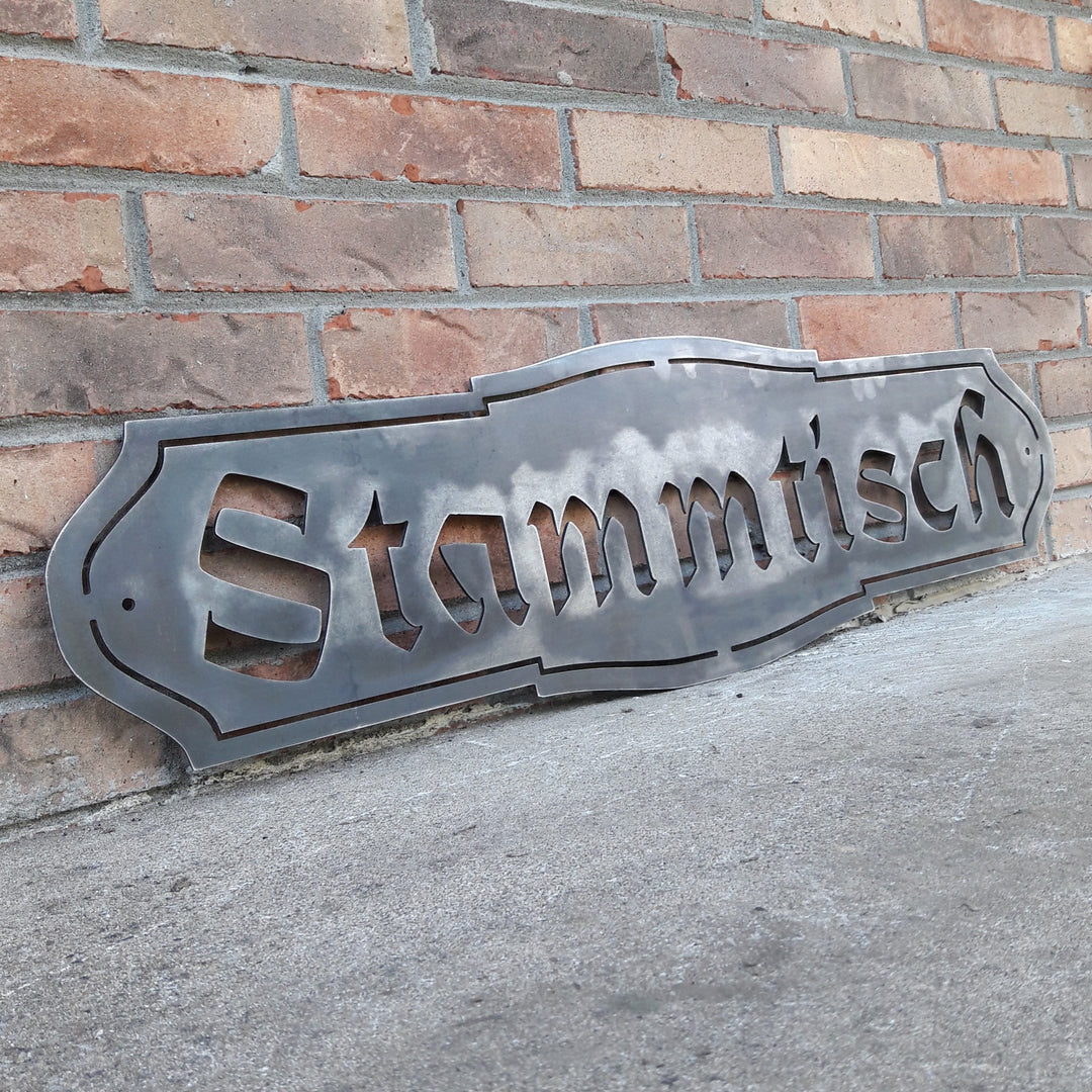 This Metal Sign is written in German and reads, " Stammtisch"