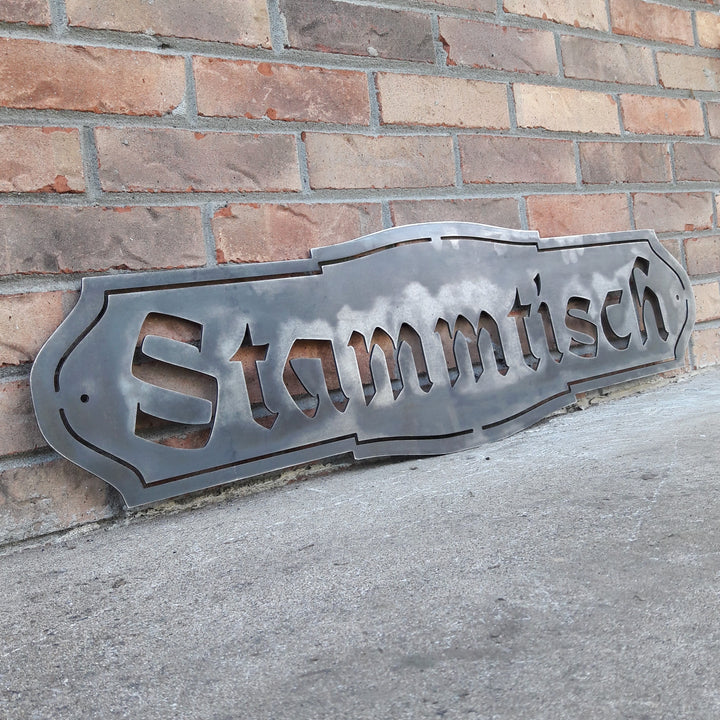 This Metal Sign is written in German and reads, " Stammtisch"