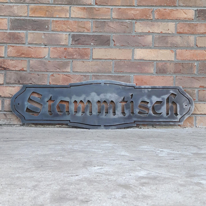 This Metal Sign is written in German and reads, " Stammtisch"