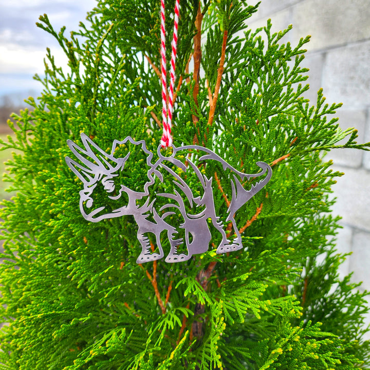 dinosaur cutout ornament in rustic raw steel