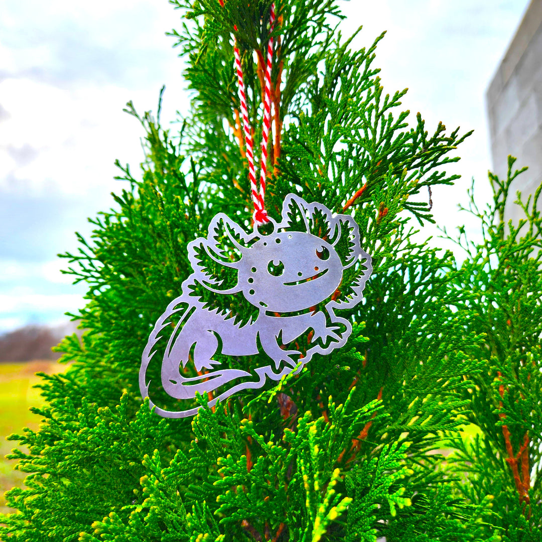 • rustic steel axolotl ornament with cutout details
