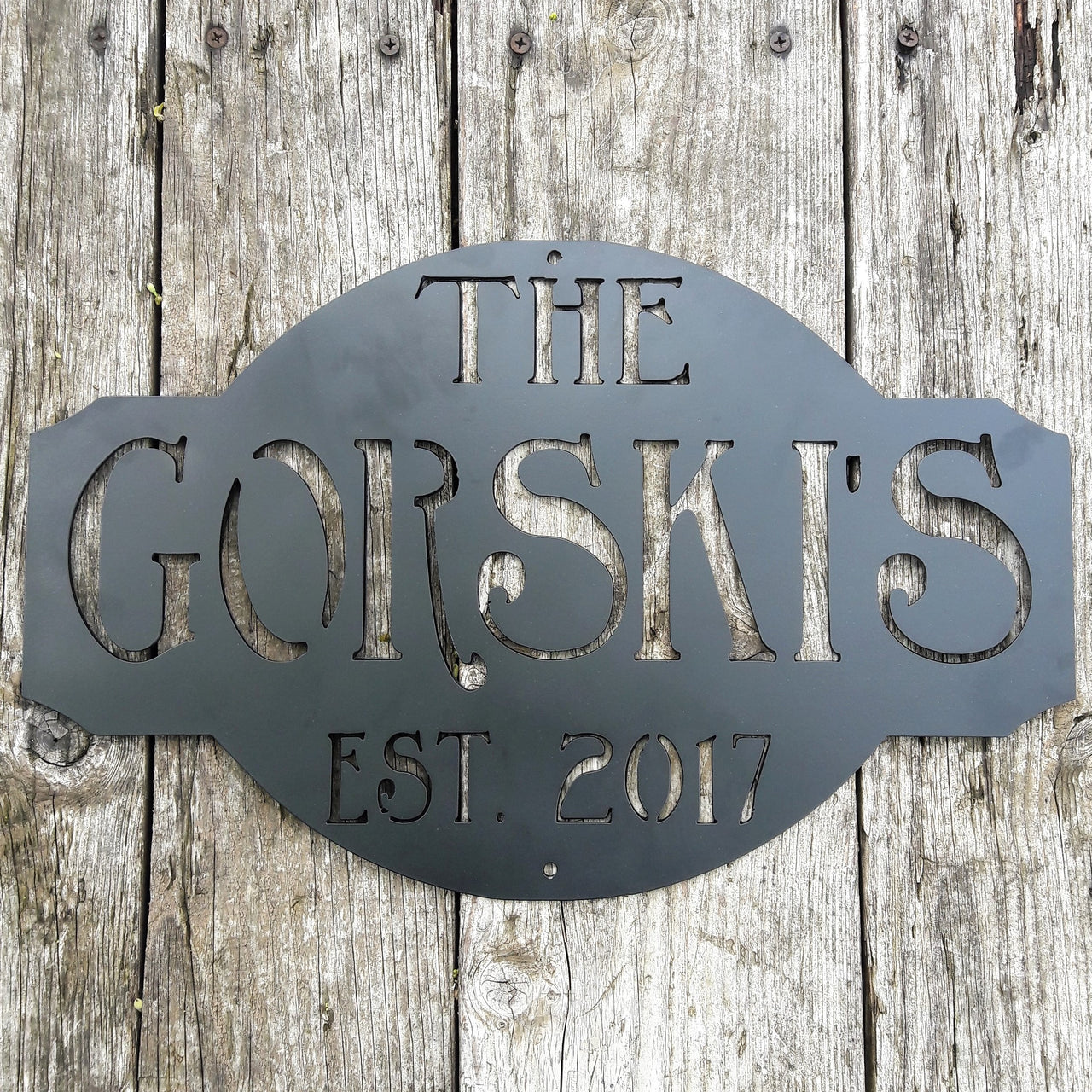 Rustic metal sign black powder coated. The sign reads, " The Gorski's est. 2017"Rustic metal sign outdoor black powder coated. The sign reads, " The Gorski's est. 2017"