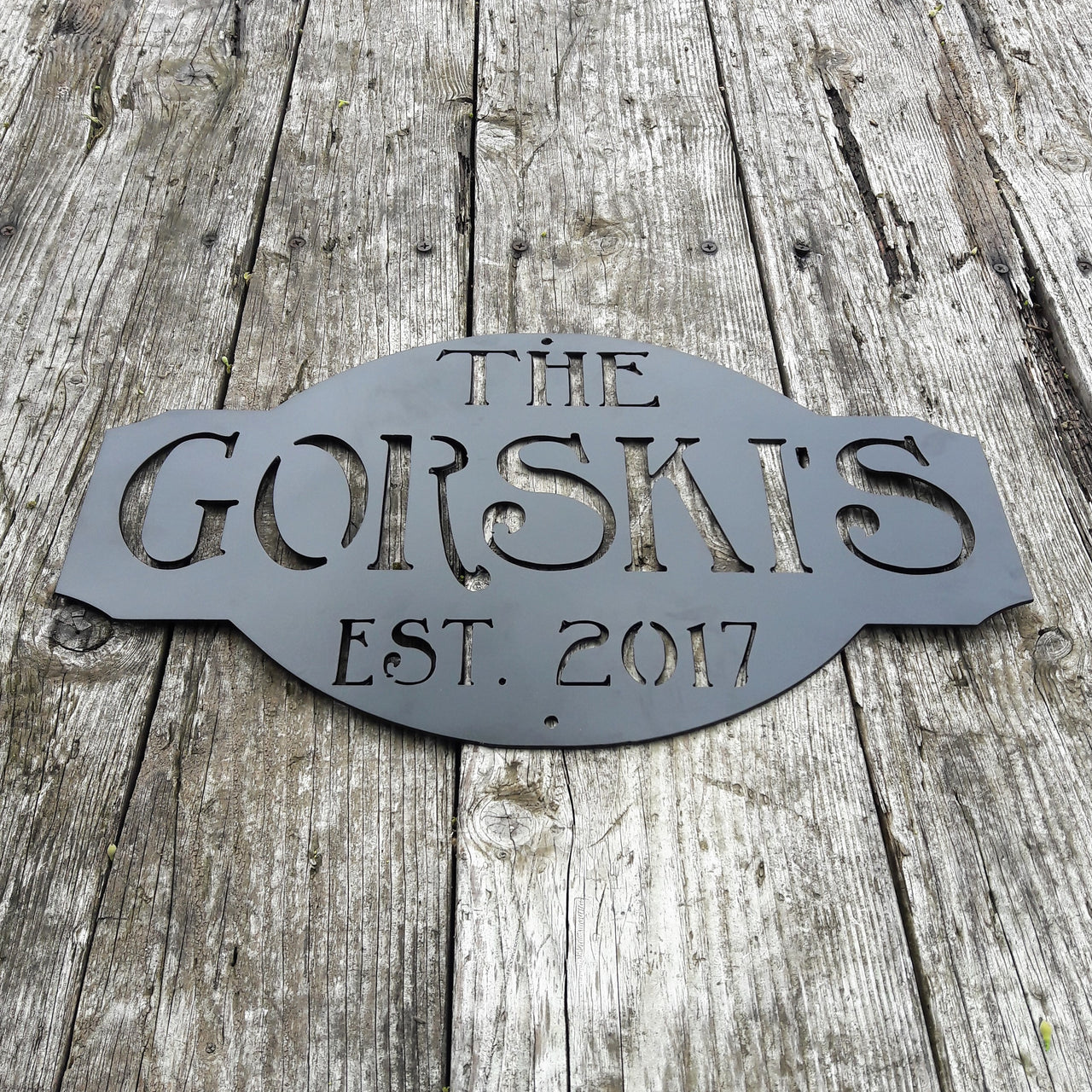 Rustic metal sign outdoor black powder coated. The sign reads, " The Gorski's est. 2017"