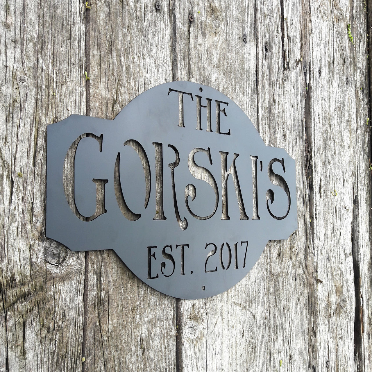 Rustic metal sign outdoor black powder coated. The sign reads, " The Gorski's est. 2017"