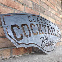 Thumbnail for This metal bar sign reads, 