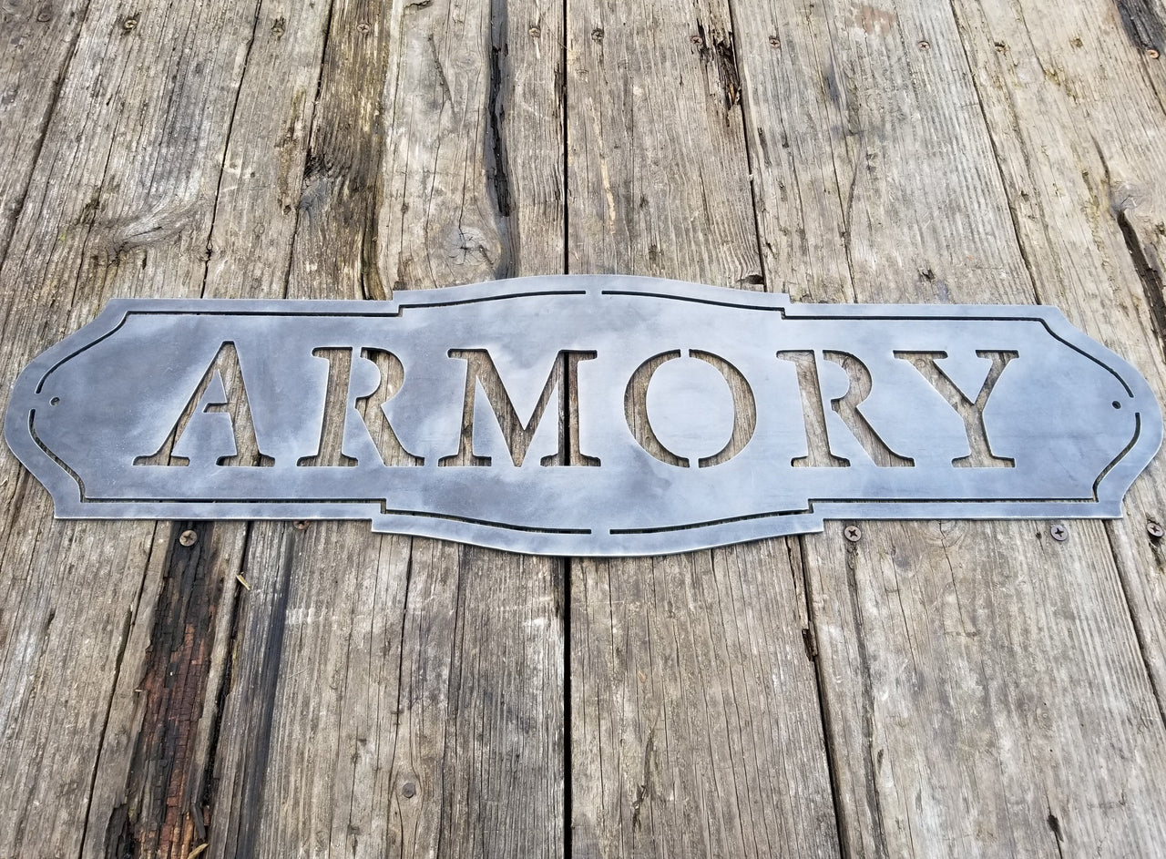 This sign has a classic shape and reads, "ARMORY"