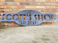 Thumbnail for This is a raw steel, custom metal sign.  At the top of the sign is an image of tools. There is two lines of text on this sign which reads, 