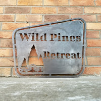 Thumbnail for This sign has a vintage design and depicts a group of trees. It reads, 