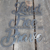 Thumbnail for Land of the Free Because of the Brave Metal Sign - Patriotic Cursive Wall Art - Fourth of July Decor