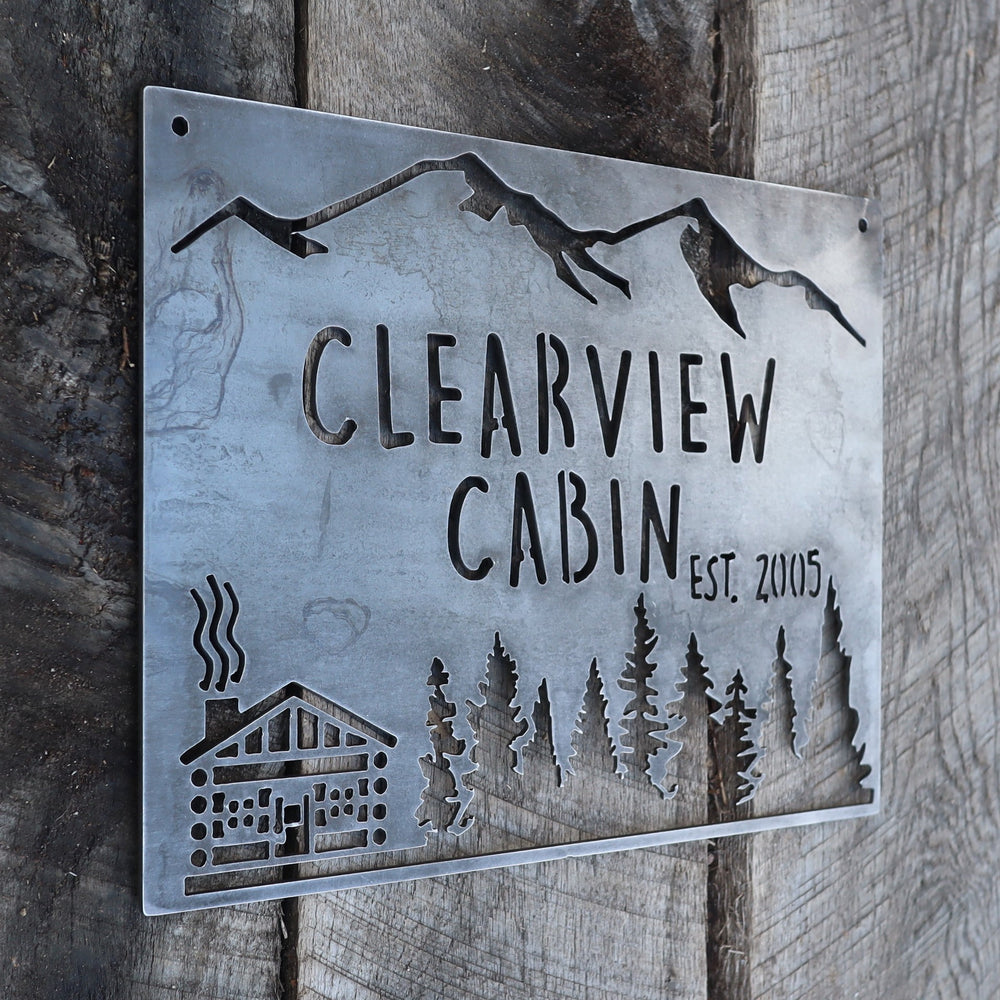 Custom cabin name plaque with wilderness design