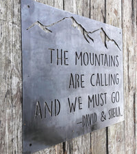 Thumbnail for This Metal sign has a mountain range across the top and features a quote by John Muir. The sign reads, 