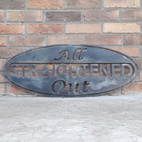 Thumbnail for This metal sign is an oval, it has three lines of text. The sign reads, 