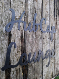 Thumbnail for This is a custom metal cursive sign that is powder coated black and reads' 