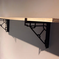Thumbnail for These metal shelf brackets are a contemporary design and fit standard lumber sizes