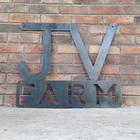 Thumbnail for This metal sign has two initials at the top followed by a block of text. It reads, 